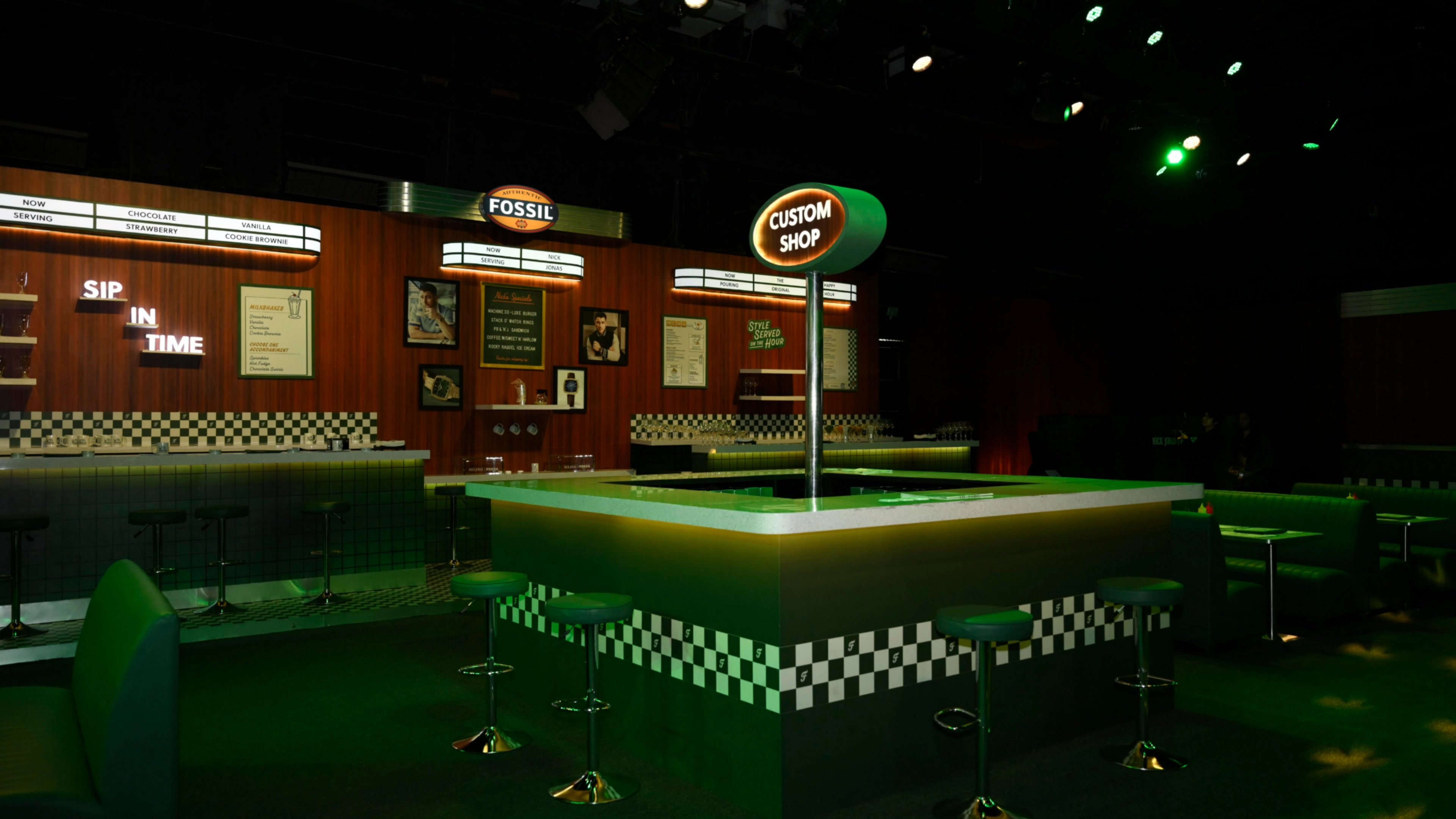 Fossil Diner activation - Jukebox and retro arcade game area with vintage gaming machines and nostalgic 1950s entertainment