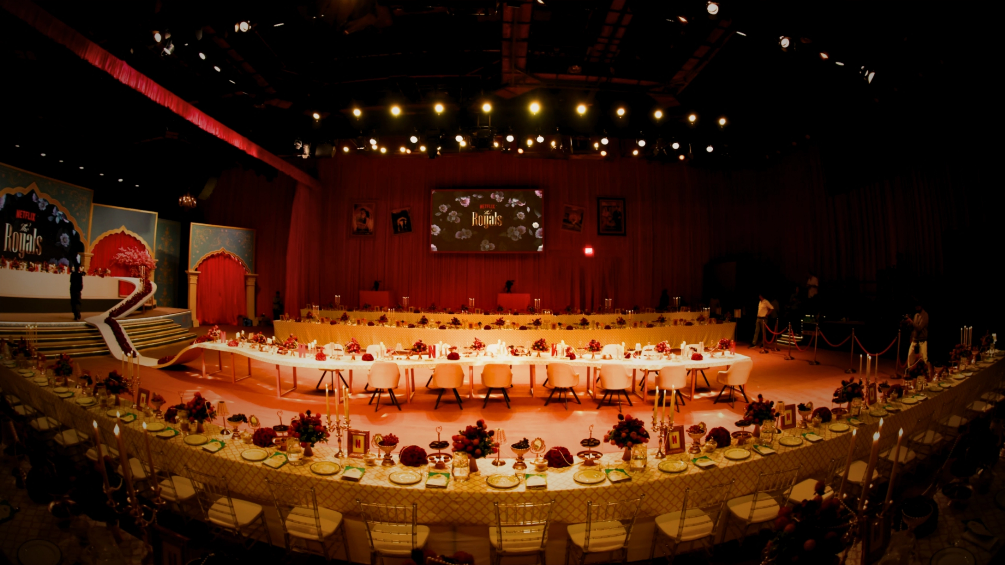 Netflix Royals launch - Grand palace darbar setup with regal decor, gold accents, luxurious furnishings, and royal ambiance for Netflix entertainment launch event at Yash Raj Studios
